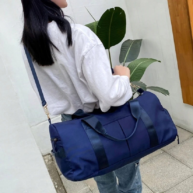 Dámská cestovní taška přes rameno s kapsou na boty vhodná do fitnes i na plavání TAJO CT60