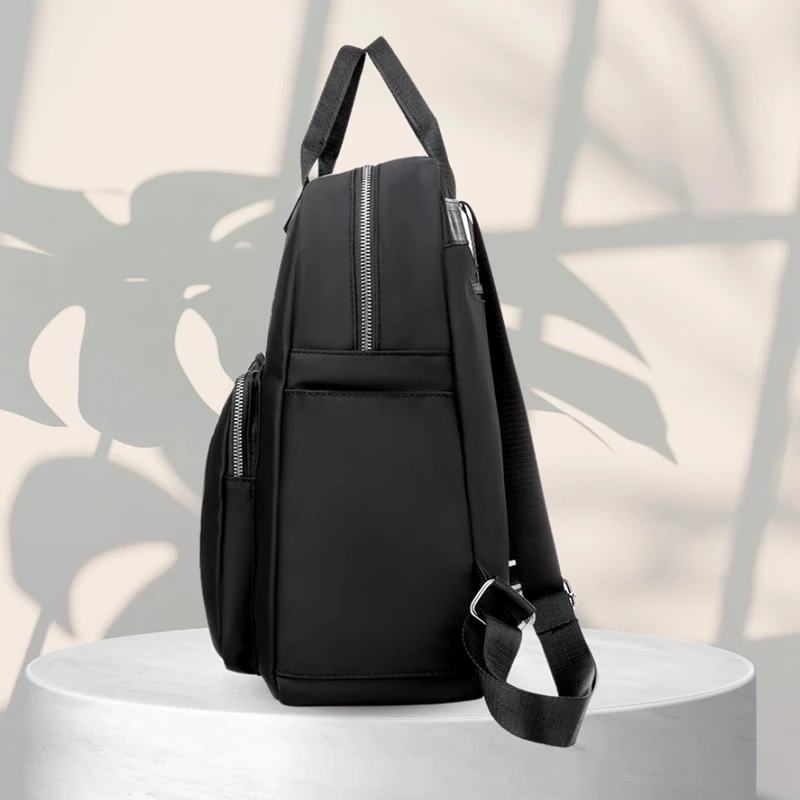 Prostorný dámský velký batoh PONTIE RX21 v černém provedení - kapsa po stranách 