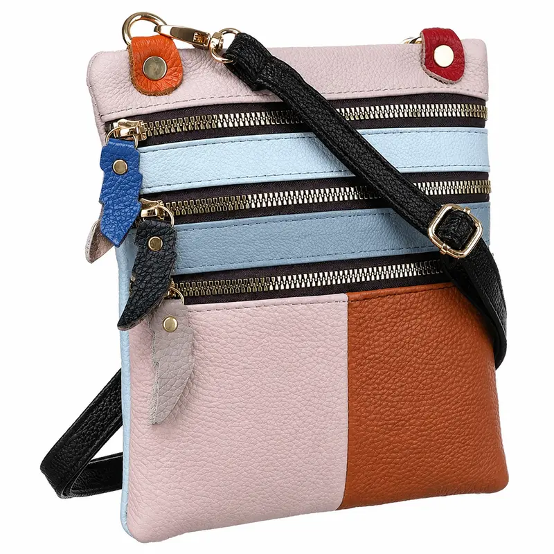 Dámská kožená crossbody kabelka CAVALDI 1718 ve světle růžovém, modrém a koňakově hnědém provedení.