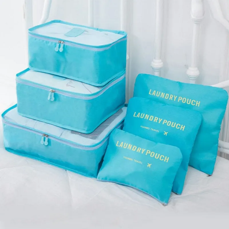 Cestovní organizéry na oblečení a kosmetiku v modrém provedení